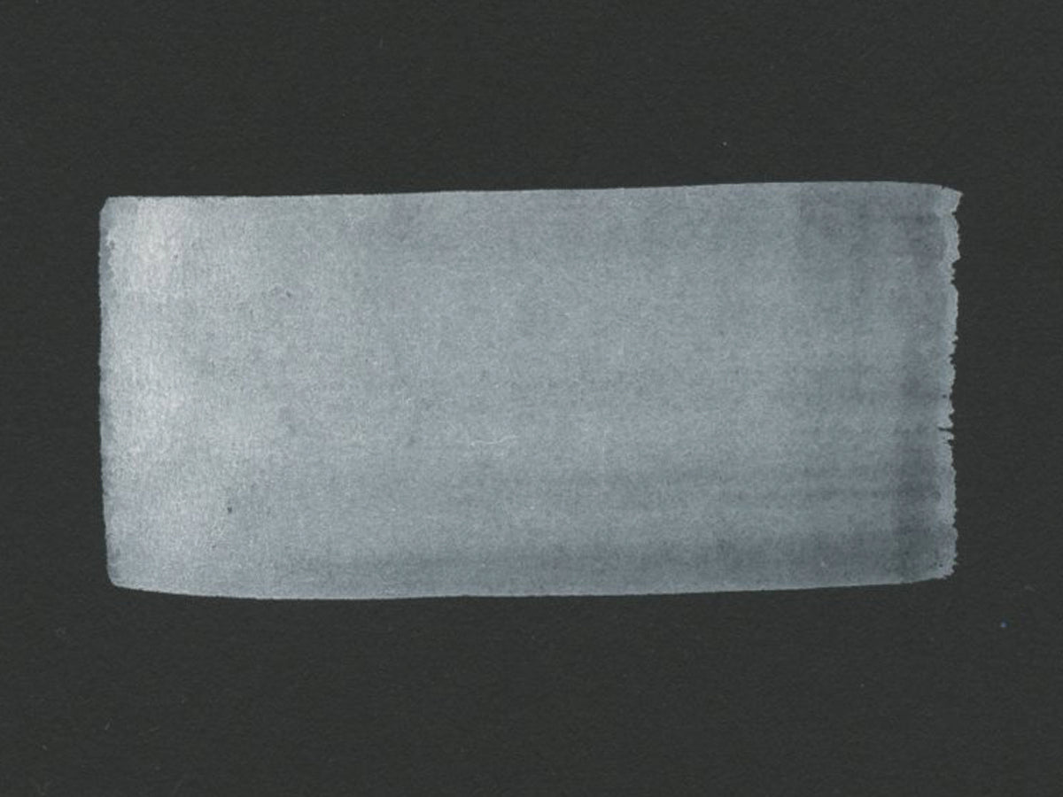 A hand painted swatch of Kremer White.