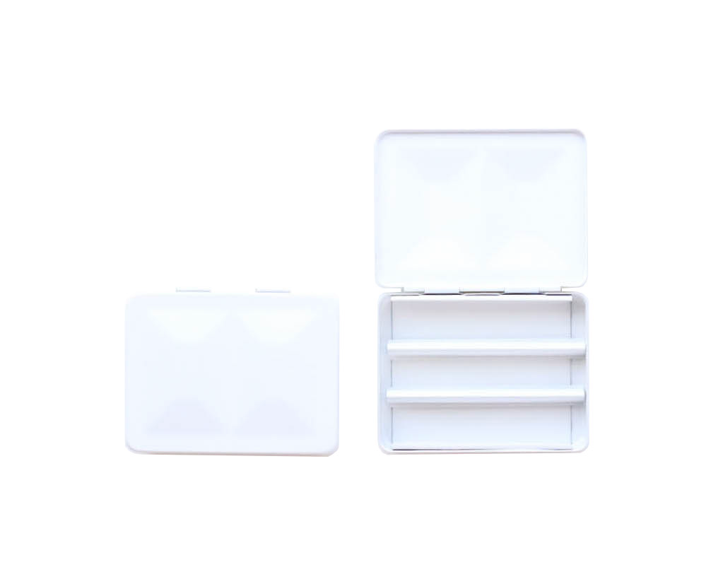 The CfM Simple Travel Palette in Matte White.  Shown closed and open, side by side. The open case features wells in the lid for mixing colors and can fit a removable swatch card.