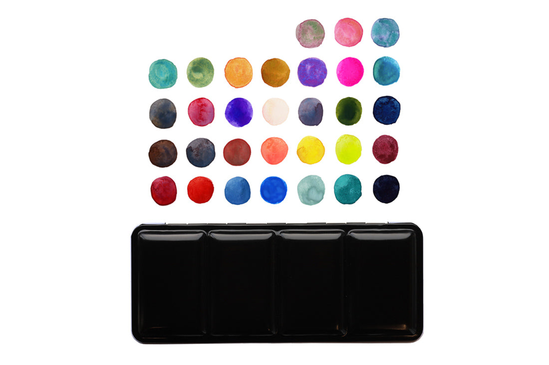 A black four-compartment watercolor paint palette shown open below a grid of colorful watercolor swatches on a white background.