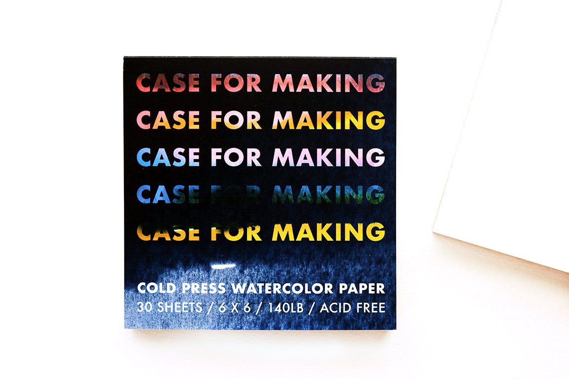 The Case for Making brand 6" x 6" Cold Press Watercolor Paper pad.  Closed pad, top tape-bound.
