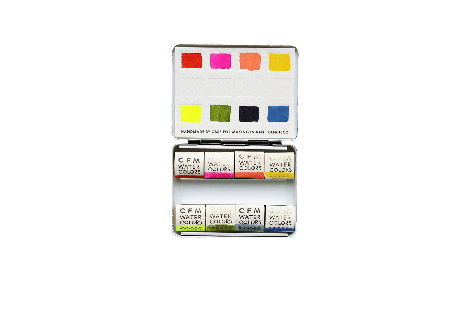 A handmade watercolor palette featuring Case for Making Colors: French Vermilion, CfM Hot Pink, CfM Coral, CfM Oxalis, Fluorescent Yellow 2, CfM Olive, Synthetic Indigo, CfM Shadow Blue open on a white backrgound