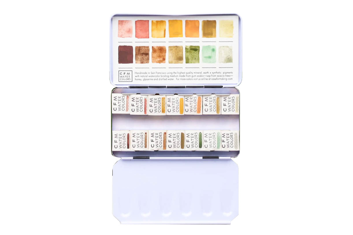Case for Making pans filled with handmade watercolor paint, ready to be placed into the 14-Color Natural Earth Watercolor Palette.