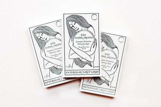 Showing three of the Watercolor Tarot Cards Packs.