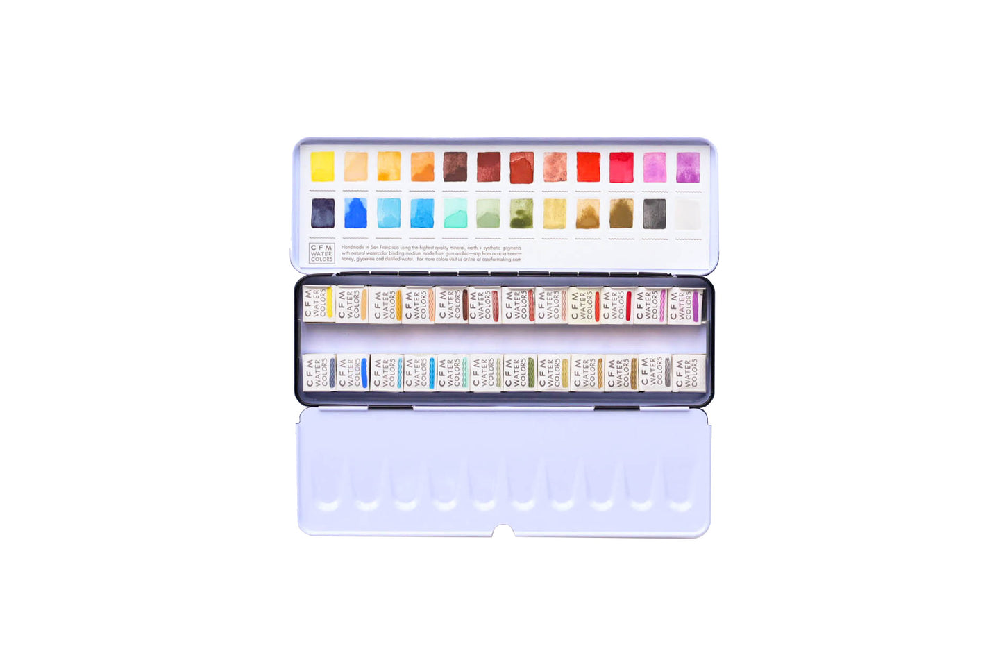Case for Making pans filled with handmade watercolor paint, ready to be placed into the 24-Color Core Collection Watercolor Palette.
