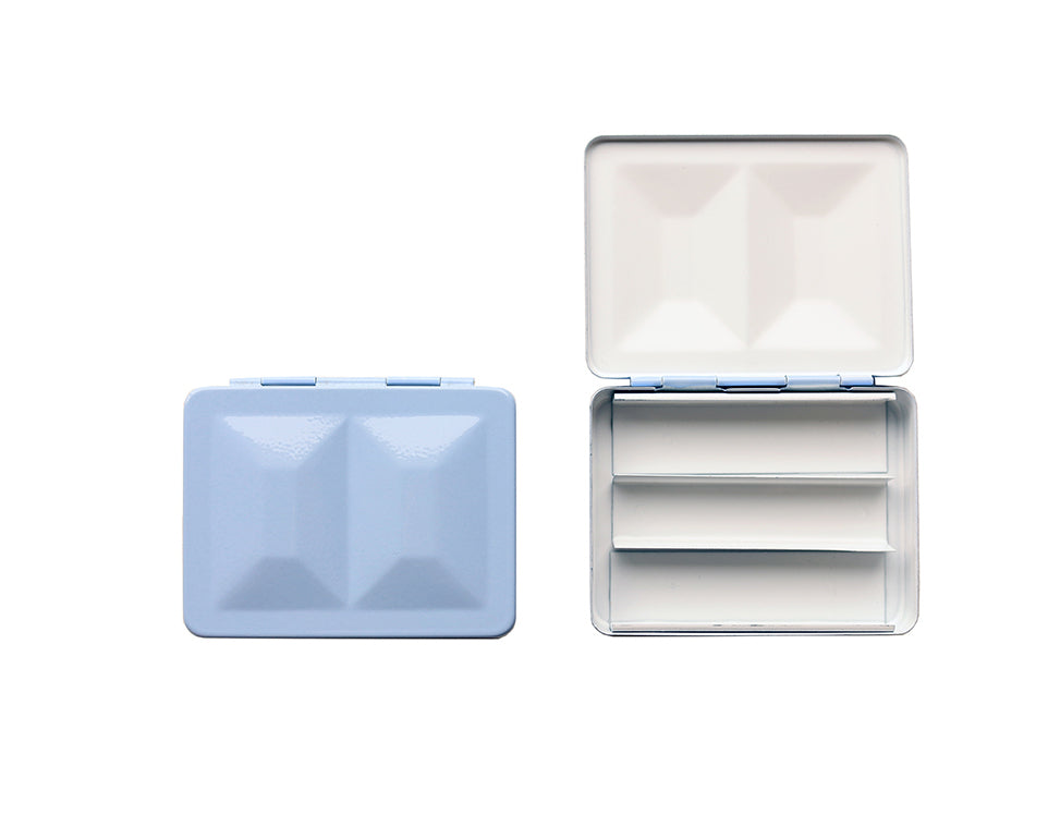 The CfM Simple Travel Palette in Glossy Iris Blue.  Shown closed and open, side by side. The open case features wells in the lid for mixing colors and can fit a removable swatch card.