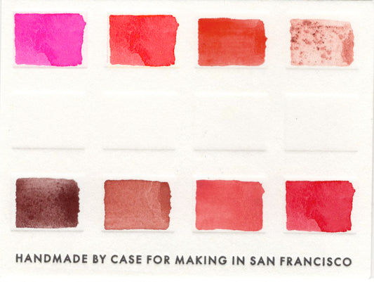 A close up of the pre-painted Monochromatic Red/Pink Palette swatch card.