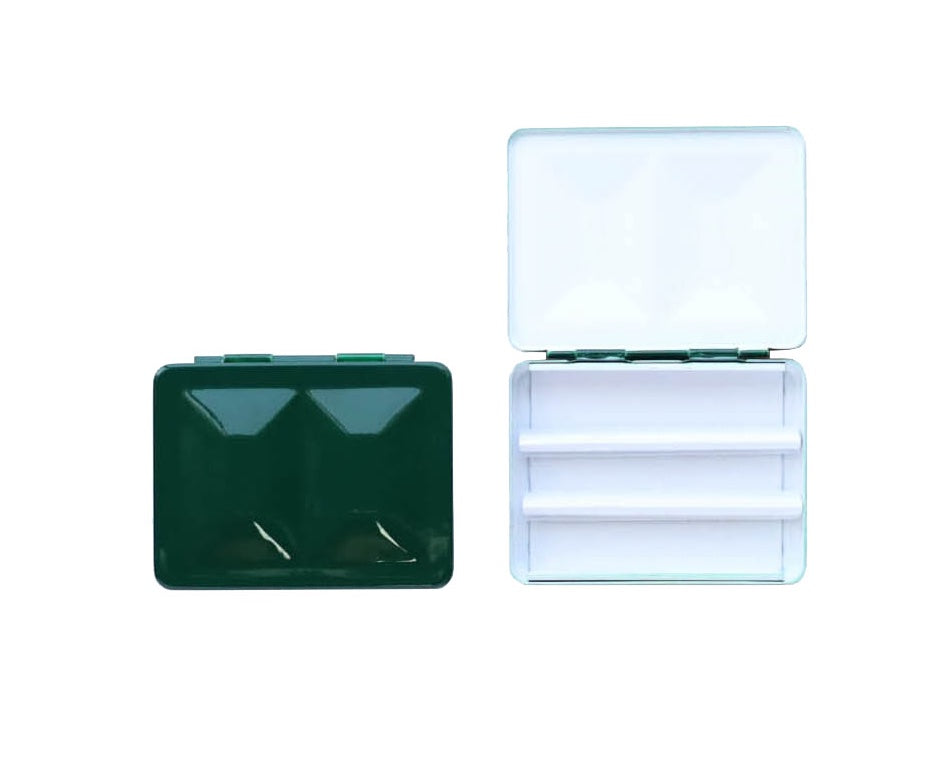 The CfM Simple Travel Palette in Glossy Cypress Green.  Shown closed and open, side by side. The open case features wells in the lid for mixing colors and can fit a removable swatch card.