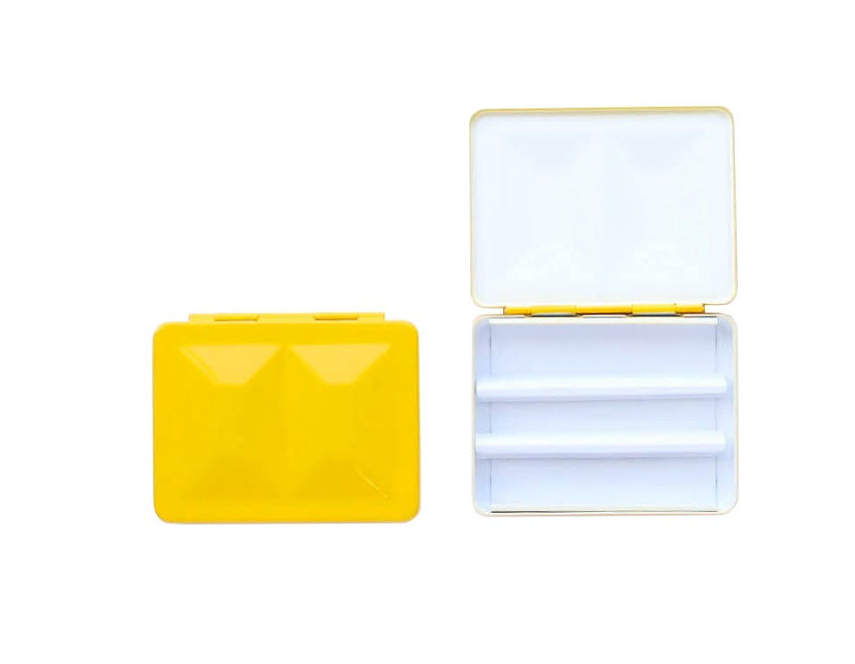The CfM Simple Travel Palette in Glossy Egg Yolk Yellow.  Shown closed and open, side by side. The open case features wells in the lid for mixing colors and can fit a removable swatch card.