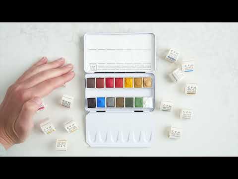 How To Fill Your Palette Video - shows the process of opening your set, unwrapping the watercolors, and swatching out the colors on the swatch card.