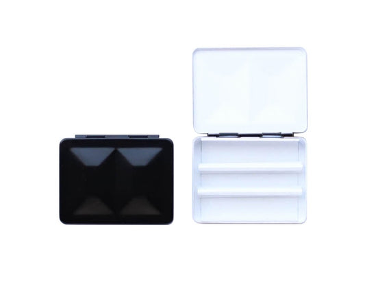 The CfM Simple Travel Palette in Glossy Black.  Shown closed and open, side by side. The open case features wells in the lid for mixing colors and can fit a removable swatch card.